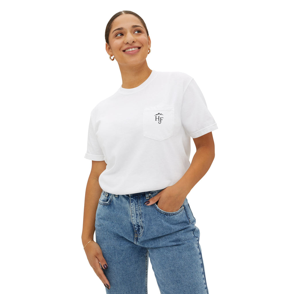 Female model wearing white unisex outdoor pocket tee with small Hippie Fishy logo, designed for fishing, camping and outdoor lifestyle.
