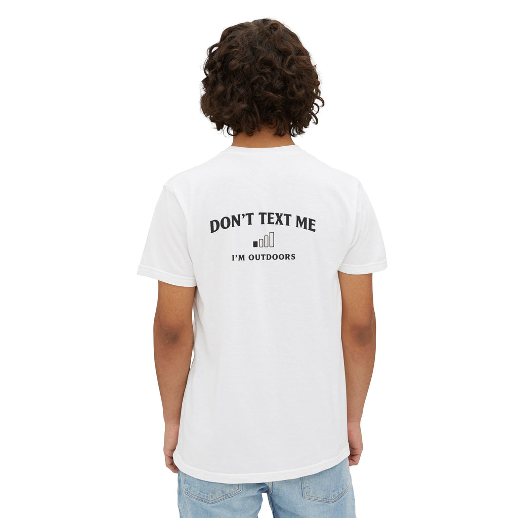 Back view of model wearing white unisex outdoor pocket tee with "Don't Text Me I'm Outdoors" design, made for fishing and outdoor lifestyle.