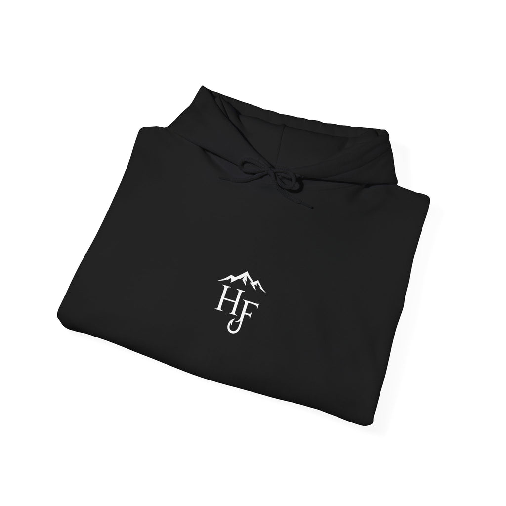 Folded black unisex outdoor hoodie with small Hippie Fishy logo, designed for camping, fishing, hiking and outdoor lifestyle.